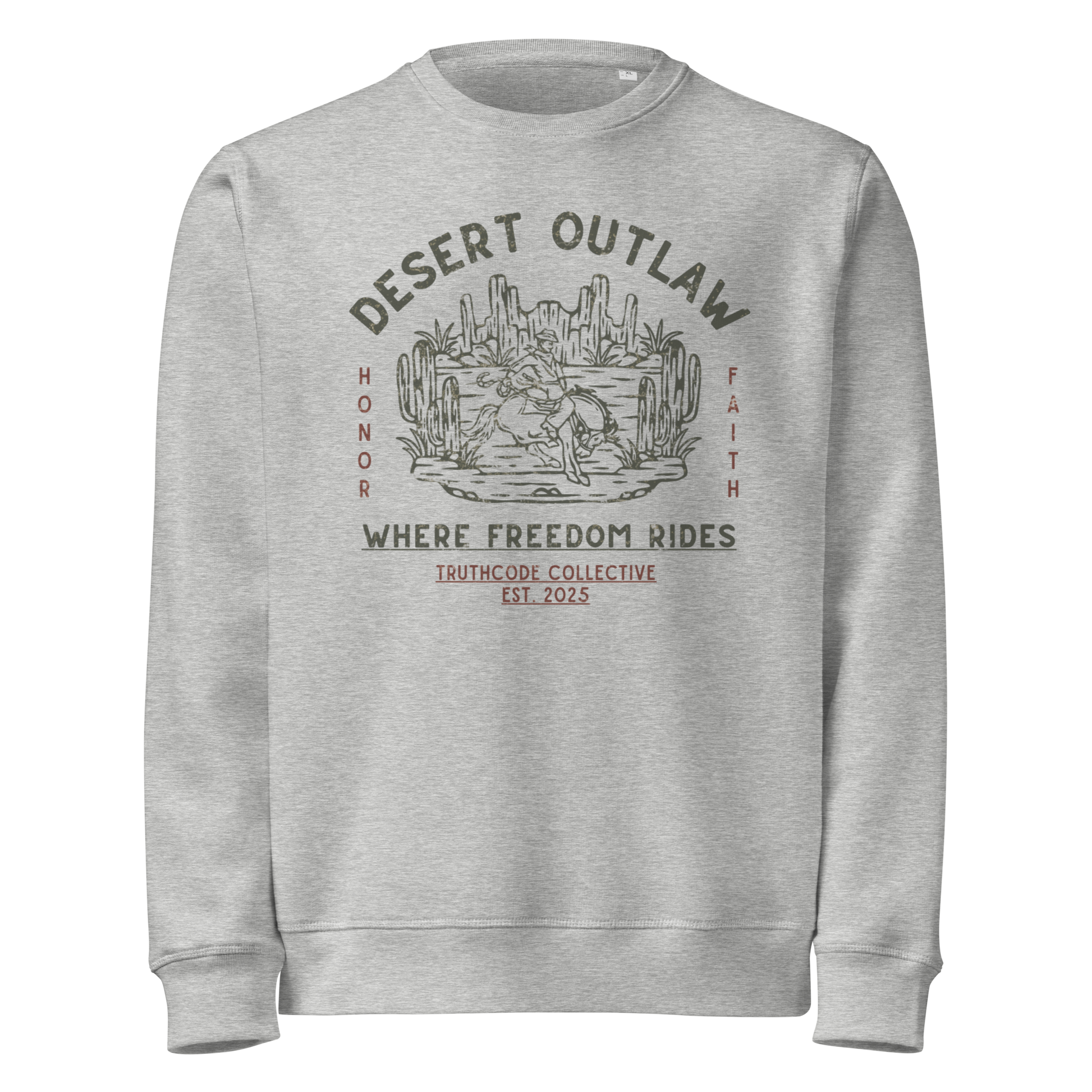 Gray organic sweatshirt with 'Desert Outlaw, where freedom rides' text and graphic design of cowboy riding a broco in the desert, on a white background