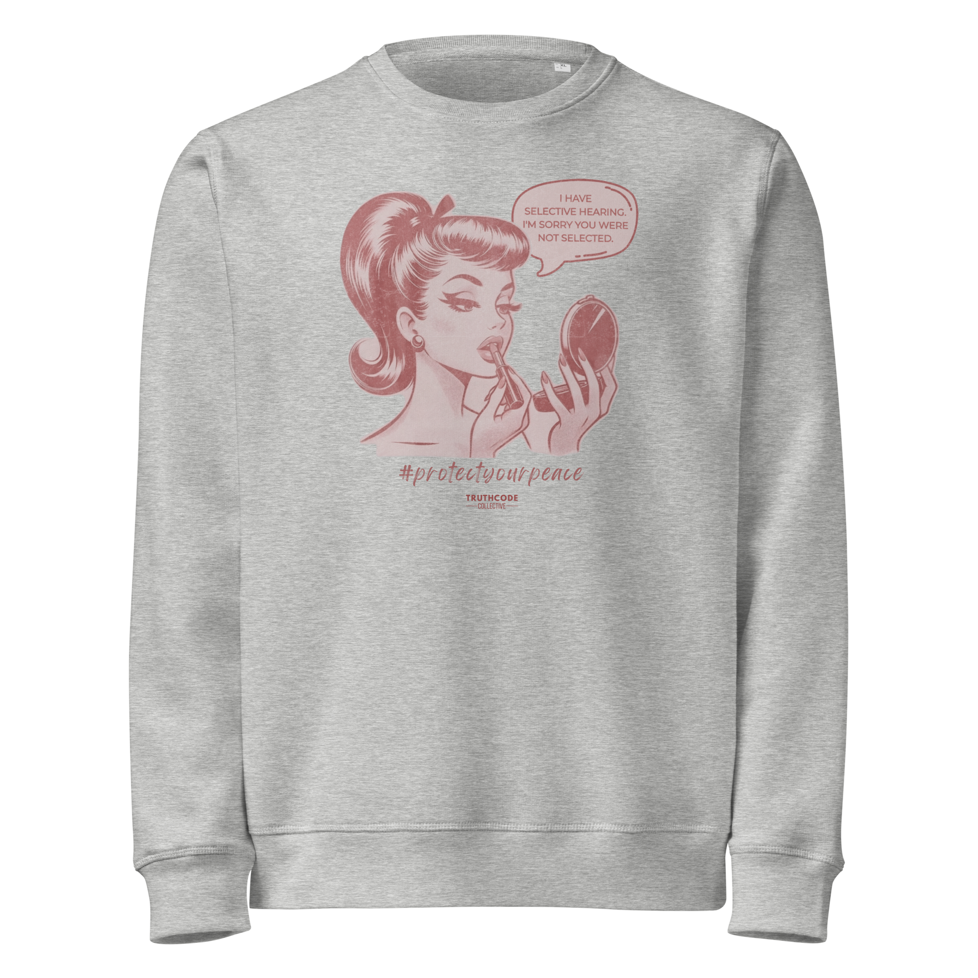 Gray organic sweatshirt with a vintage style graphic of a woman and text 'I have selective hearing. I'm sorry you weren't selected' on a white background