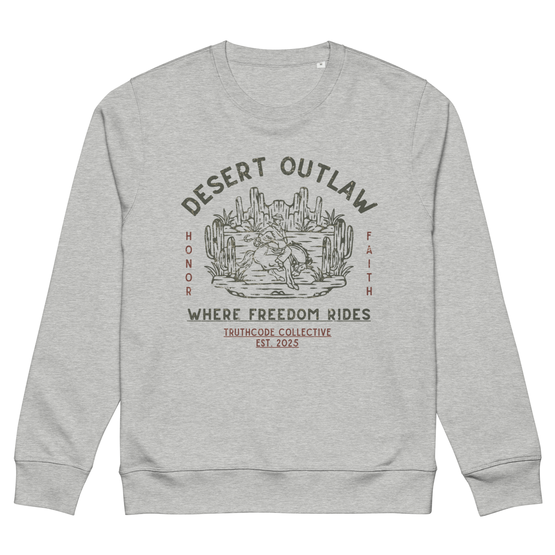 Gray organic sweatshirt with text 'Desert Outlaw, where freedom rides' and scene of cowboy on a bronco in desert graphic design, on a white background