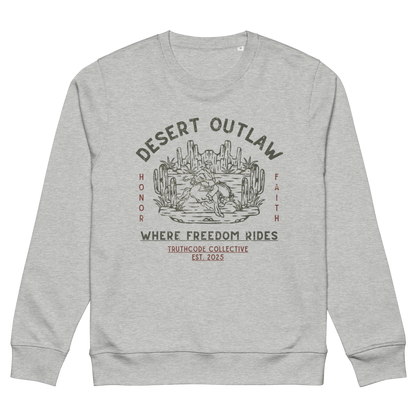Gray organic sweatshirt with text 'Desert Outlaw, where freedom rides' and scene of cowboy on a bronco in desert graphic design, on a white background