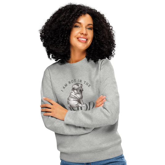 Woman wearing gray organic sweatshirt with a pug graphic and text 'I am not in the mood' on a white background