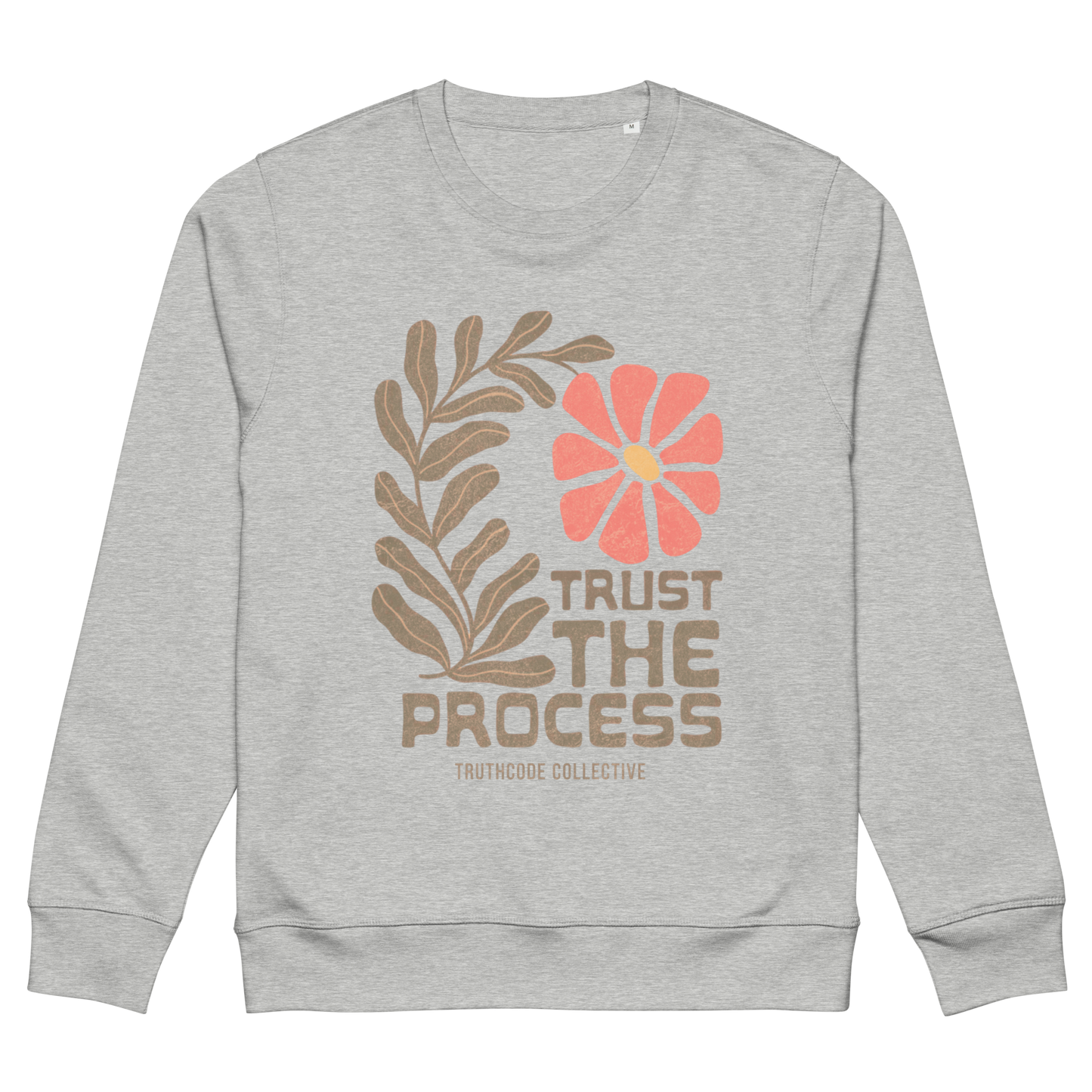 Gray organic sweatshirt with floral design and 'Trust The Process' text on a white background