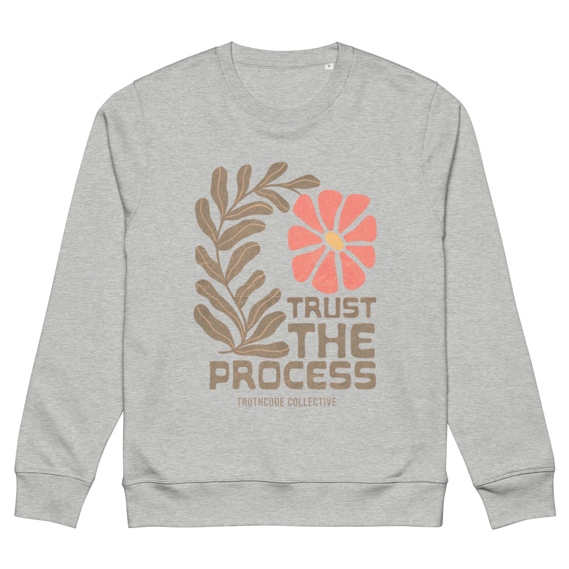 Gray organic sweatshirt with floral design and 'Trust The Process' text on a white background