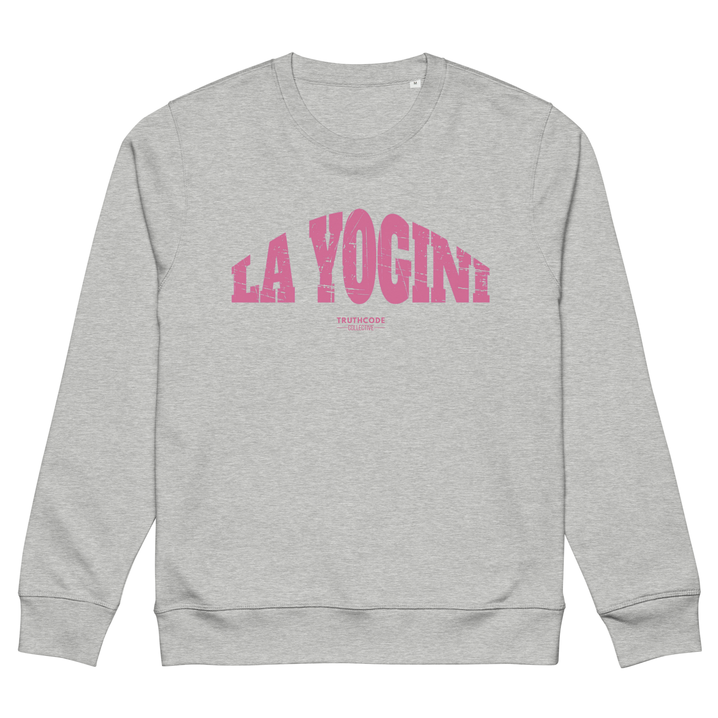 Gray organic sweatshirt with pink 'LA YOGINI' text on a white background