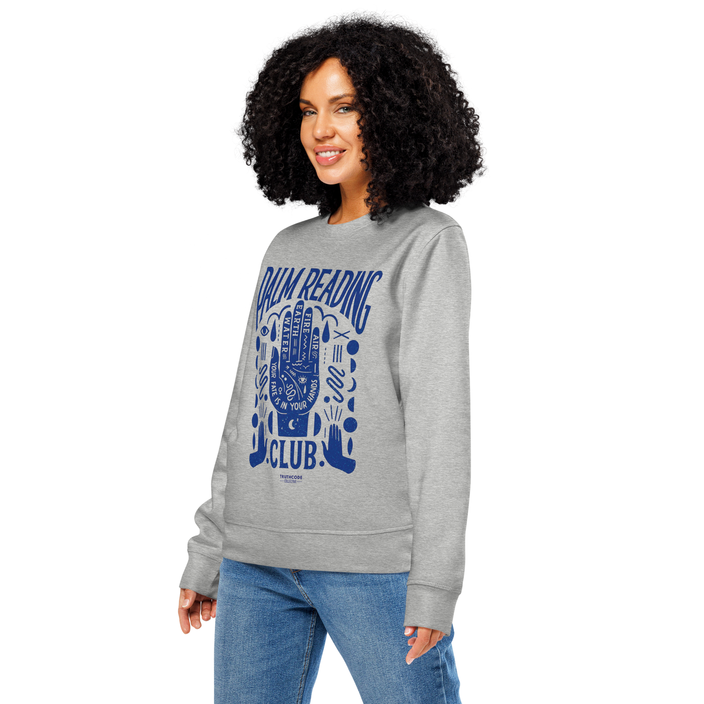 Woman wearing gray organic sweatshirt with blue palm reading design and text 'Palm reading club' on a white background