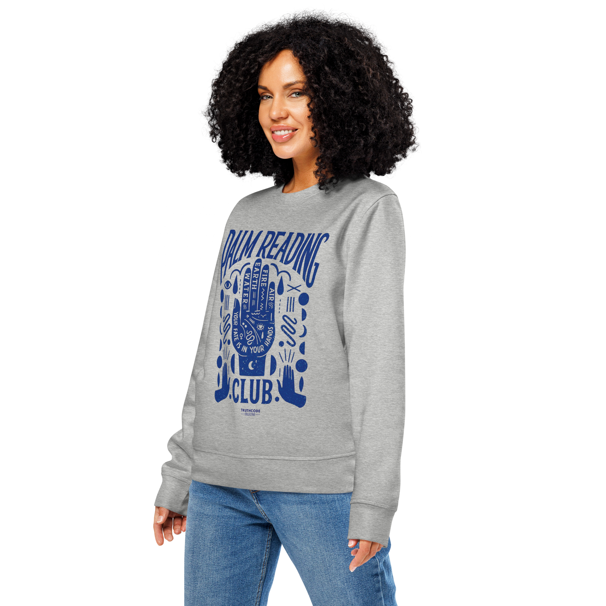 Woman wearing gray organic sweatshirt with blue palm reading design and text 'Palm reading club' on a white background