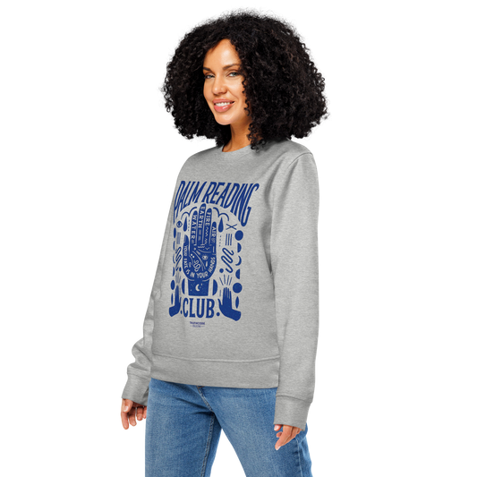 Woman wearing gray organic sweatshirt with blue palm reading design and text 'Palm reading club' on a white background