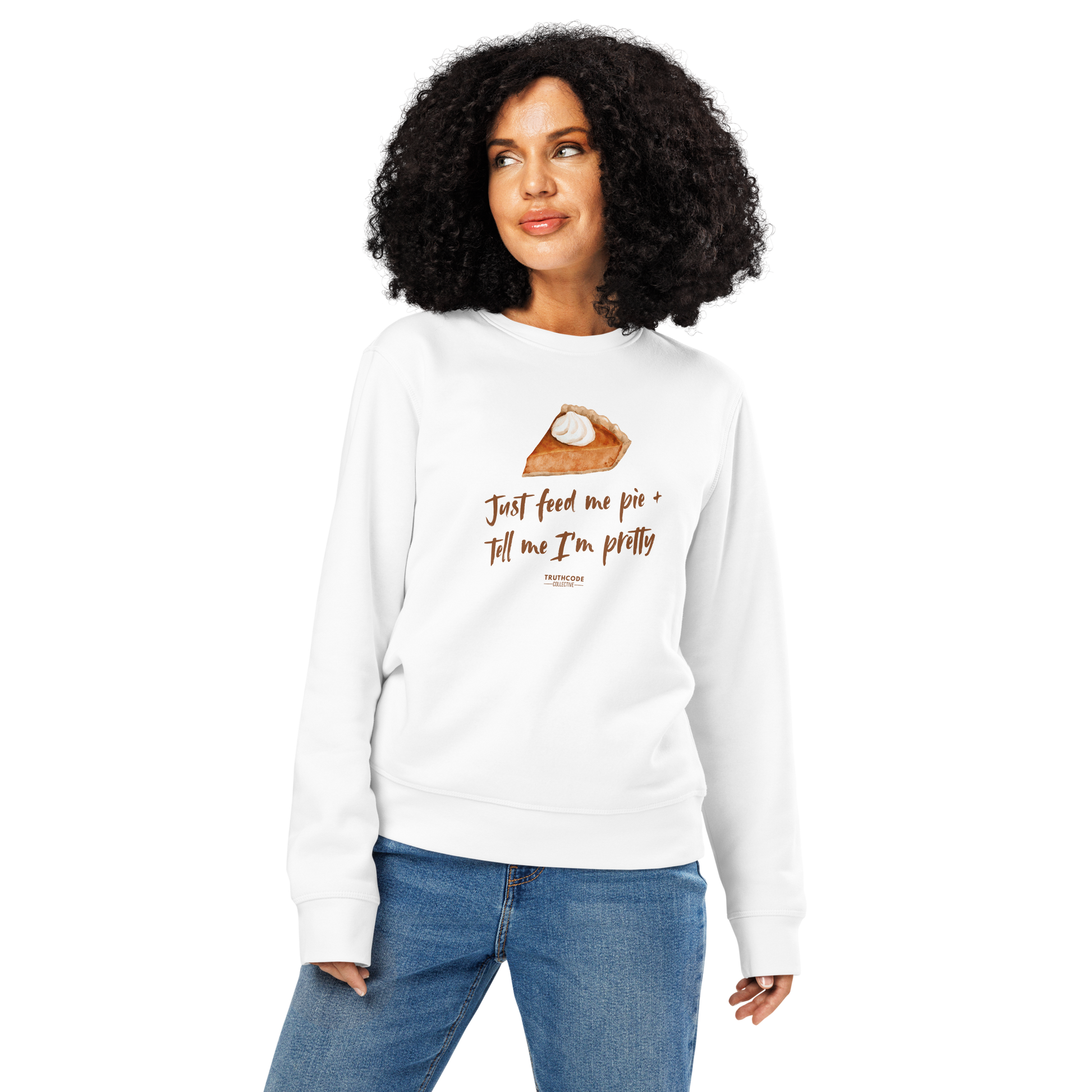 Woman wearing white organic sweatshirt with a pie graphic and text 'Just feed me pie and tell me I'm pretty' on a white background