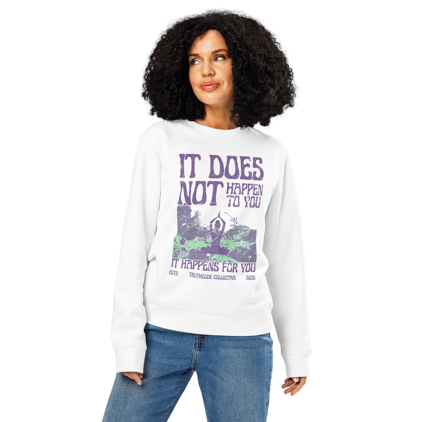 Woman wearing white organic sweatshirt with person meditating in nature graphic design and text 'It dos not happen to you, it happens for you' on a white background