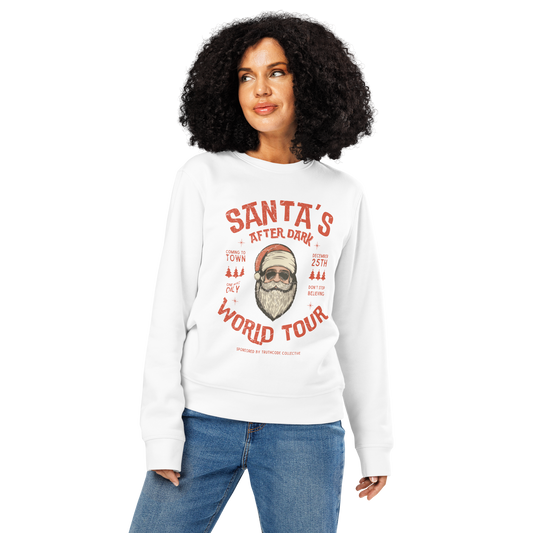 Woman wearing white organic sweatshirt with Santa Claus in sunglasses graphic and text 'Santa's after dark world tour' on a white background