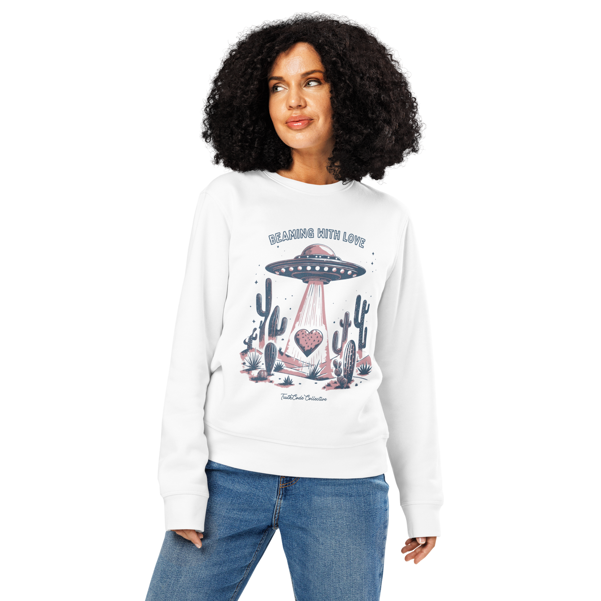Woman wearing white organic sweatshirt with a UFO and cactus design and text 'Beaming with love', on a white background