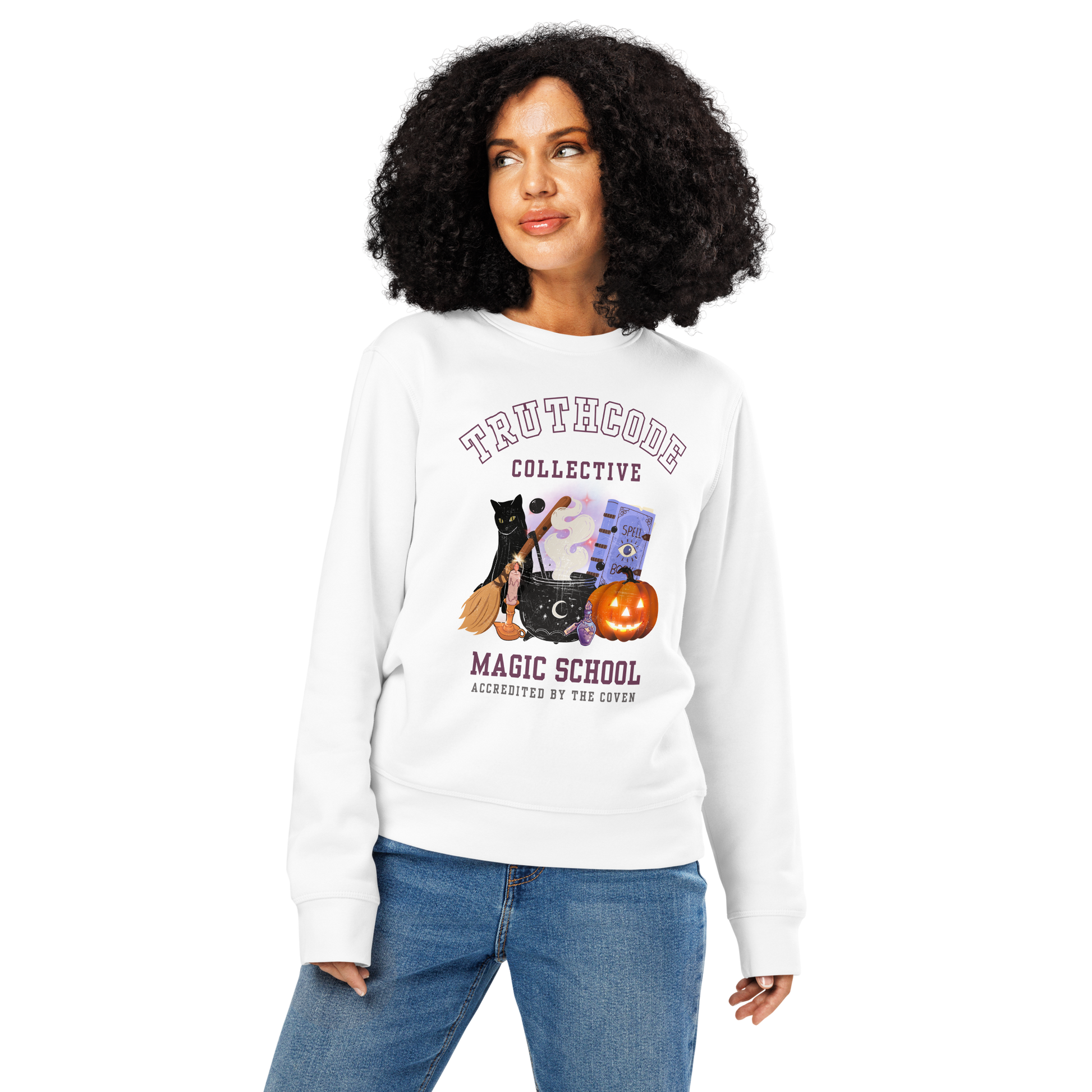 Woman wearing white organic sweatshirt with Halloween-themed design and 'TruthCode Collective Magic School' text, on a white background 