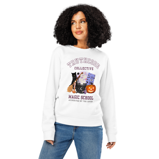 Woman wearing white organic sweatshirt with Halloween-themed design and 'TruthCode Collective Magic School' text, on a white background 