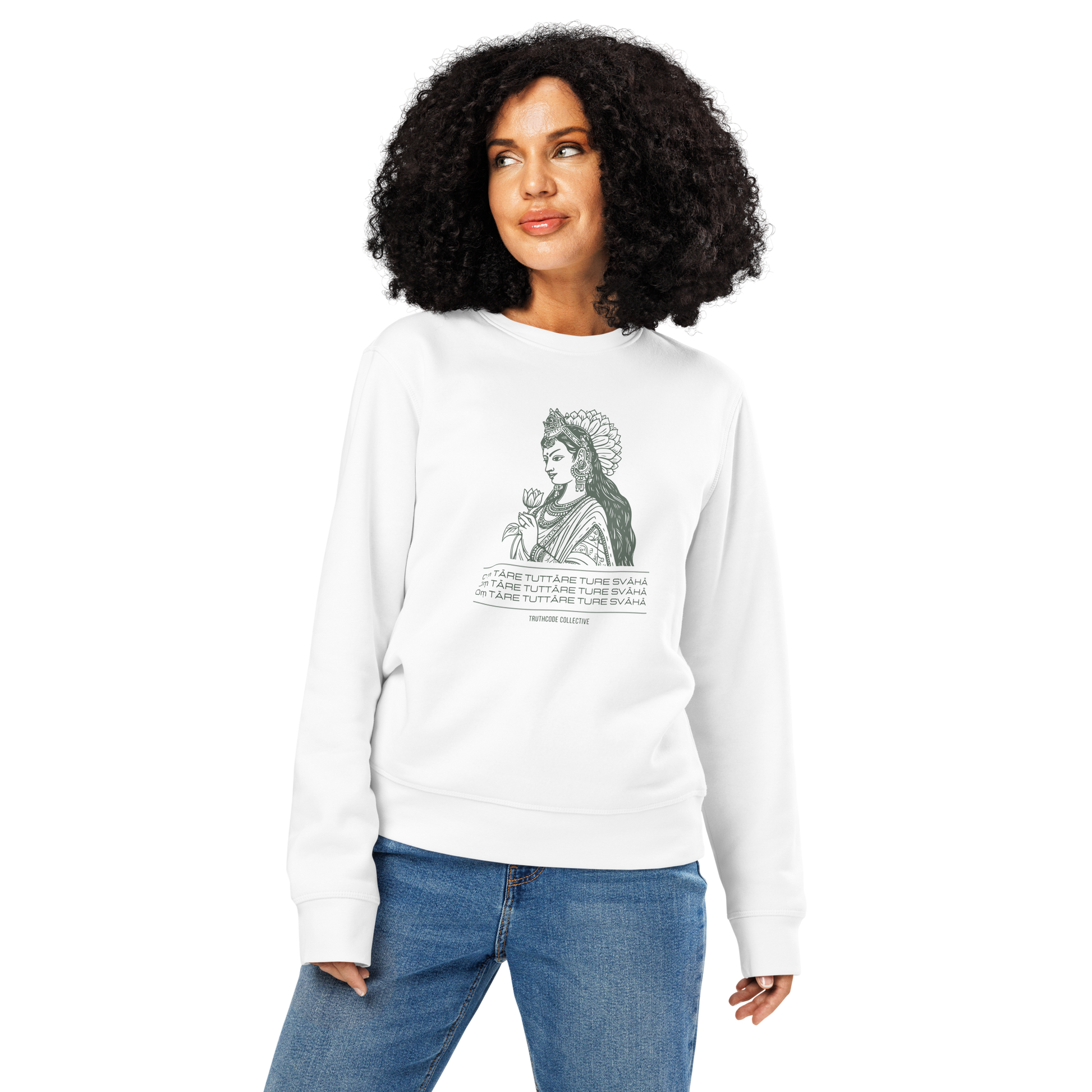 Woman wearing white organic sweatshirt with a graphic of a woman representing Green Tara holding a flower and mantra text, on a white background