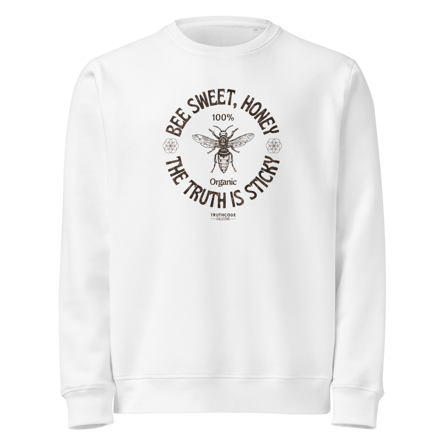 White organic sweatshirt with bee graphic and text 'Bee sweet, honey' and 'the truth is sticky' on a white background