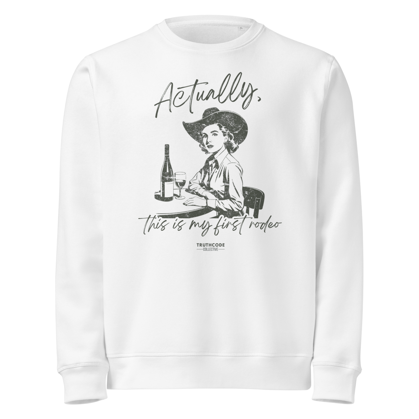 White organic sweatshirt with vintage graphic of a woman in a cowboy hat and text 'Actually, this is my first rodeo' on a white background