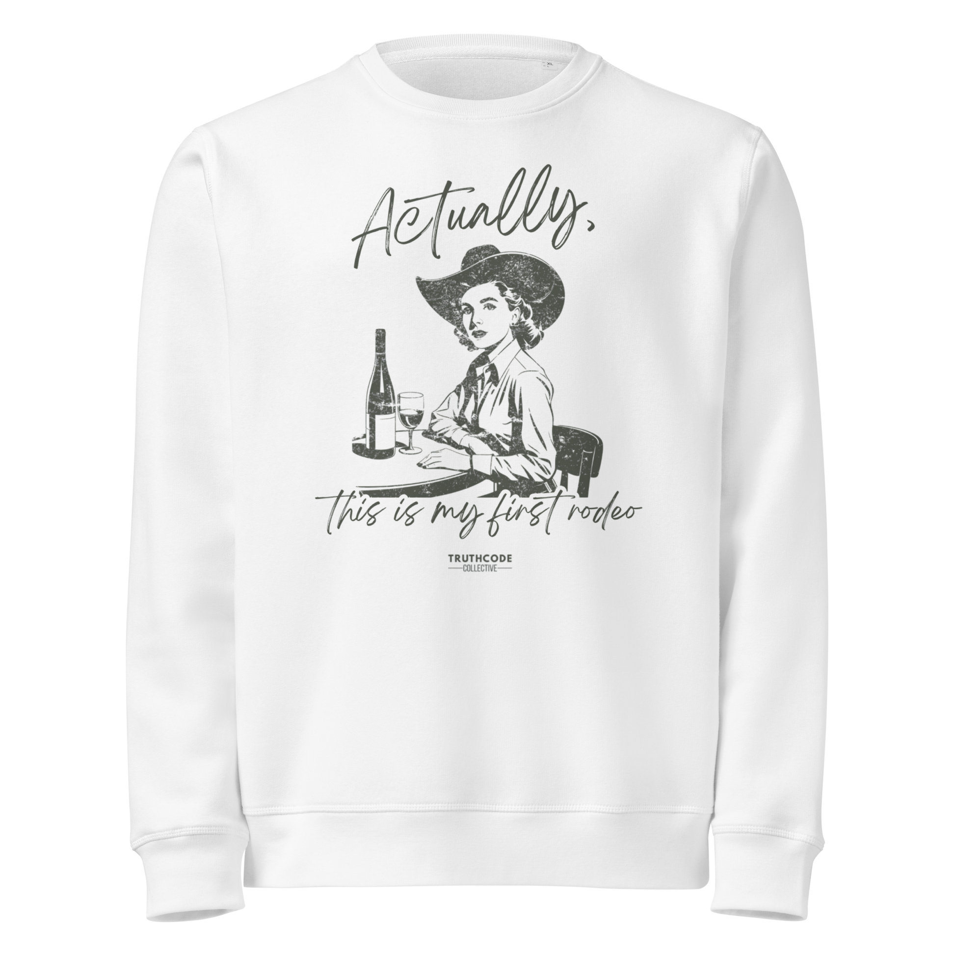 White organic sweatshirt with vintage graphic of a woman in a cowboy hat and text 'Actually, this is my first rodeo' on a white background