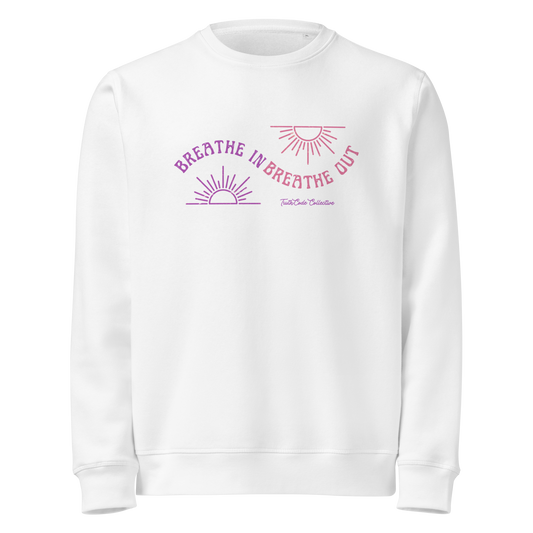 White organic sweatshirt with pink and purple sun design and text 'Breathe in breathe out' on a white background