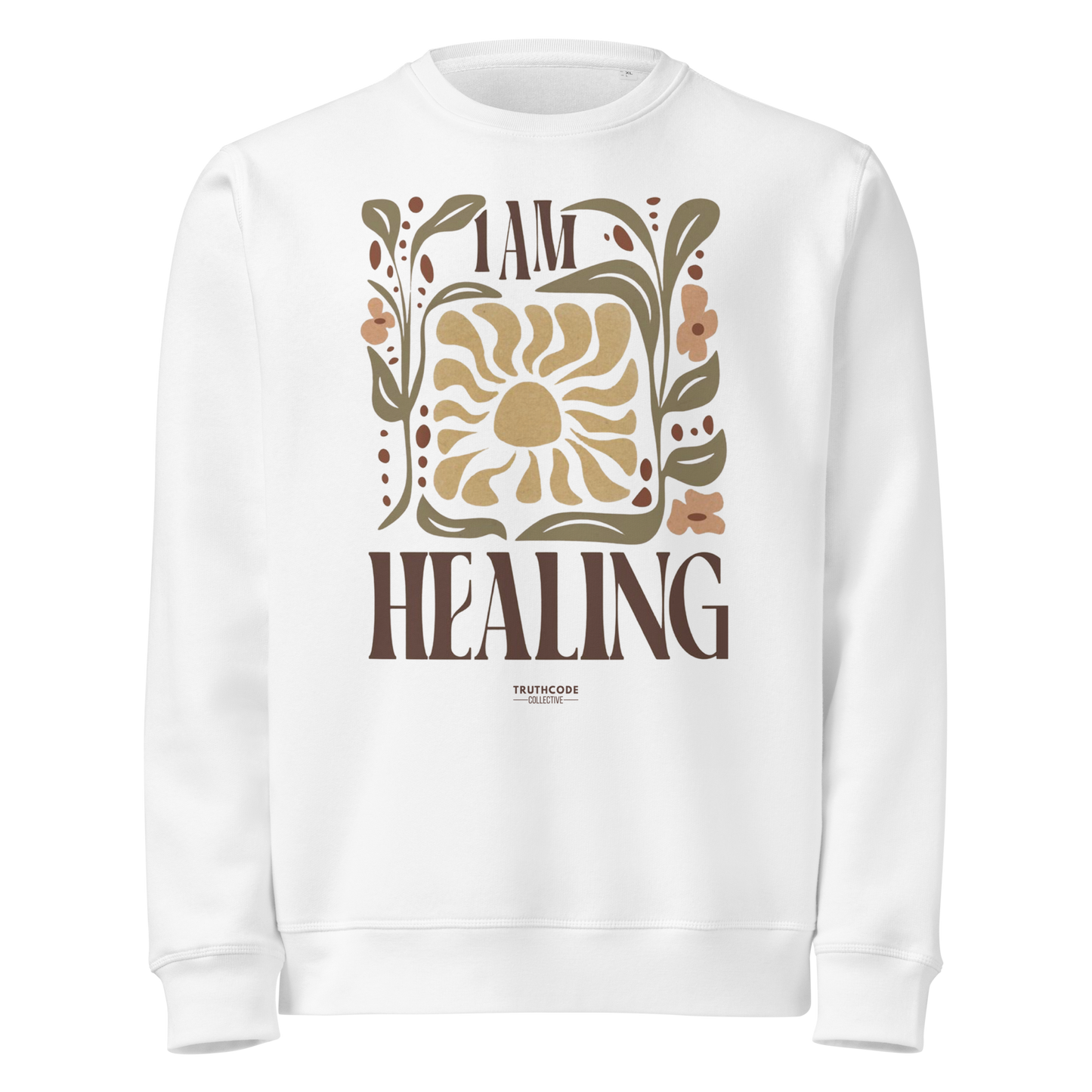White organic sweatshirt with 'I AM HEALING' text and sun and plants design on a white background