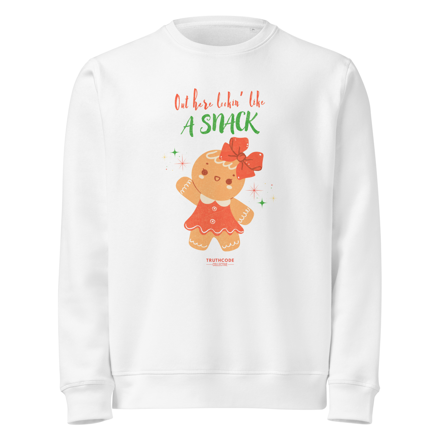 White organic sweatshirt with a gingerbread girl graphic and text 'Out here lookin' like a snack' on a white background