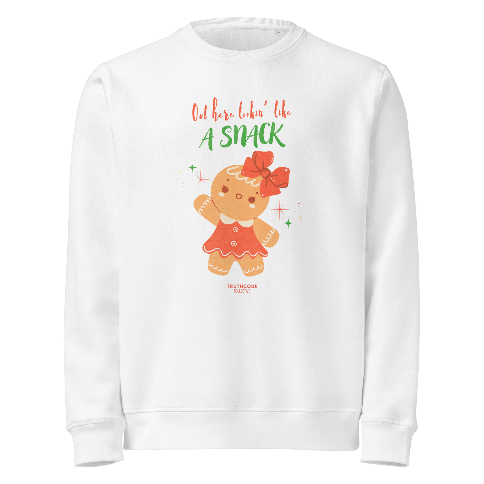 White organic sweatshirt with a gingerbread girl graphic and text 'Out here lookin' like a snack' on a white background