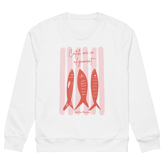 White organic sweatshirt with pink fish graphic and text 'Catch me in alignment' on a white background