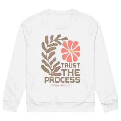 White organic sweatshirt with floral design and 'Trust The Process' text on a white background