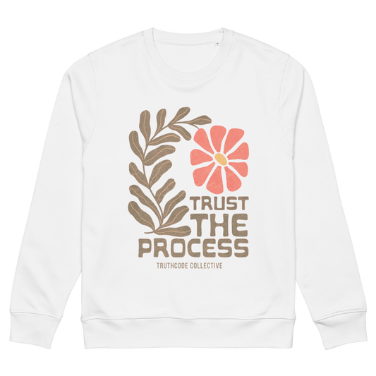White organic sweatshirt with floral design and 'Trust The Process' text on a white background