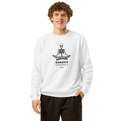 Guy wearing white organic sweatshirt with a skeleton design and 'Namaste Spooky' text on a white background