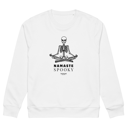 White organic sweatshirt with a skeleton design and 'Namaste Spooky' text on a white background