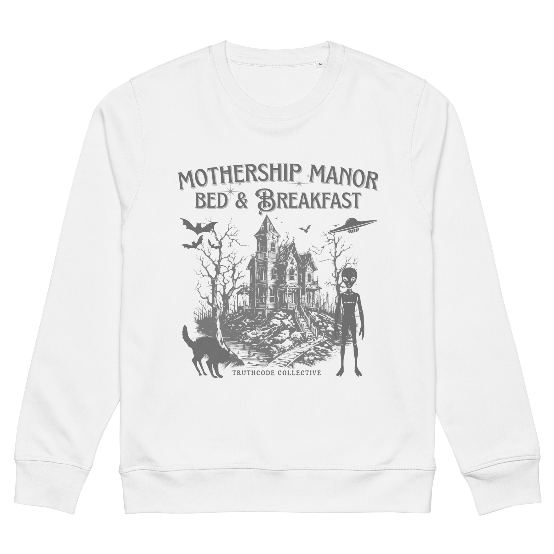 White organic sweatshirt with a graphic design of a haunted house, alien, and spaceship, with text 'Mothership Manor Bed & Breakfast' on a white background