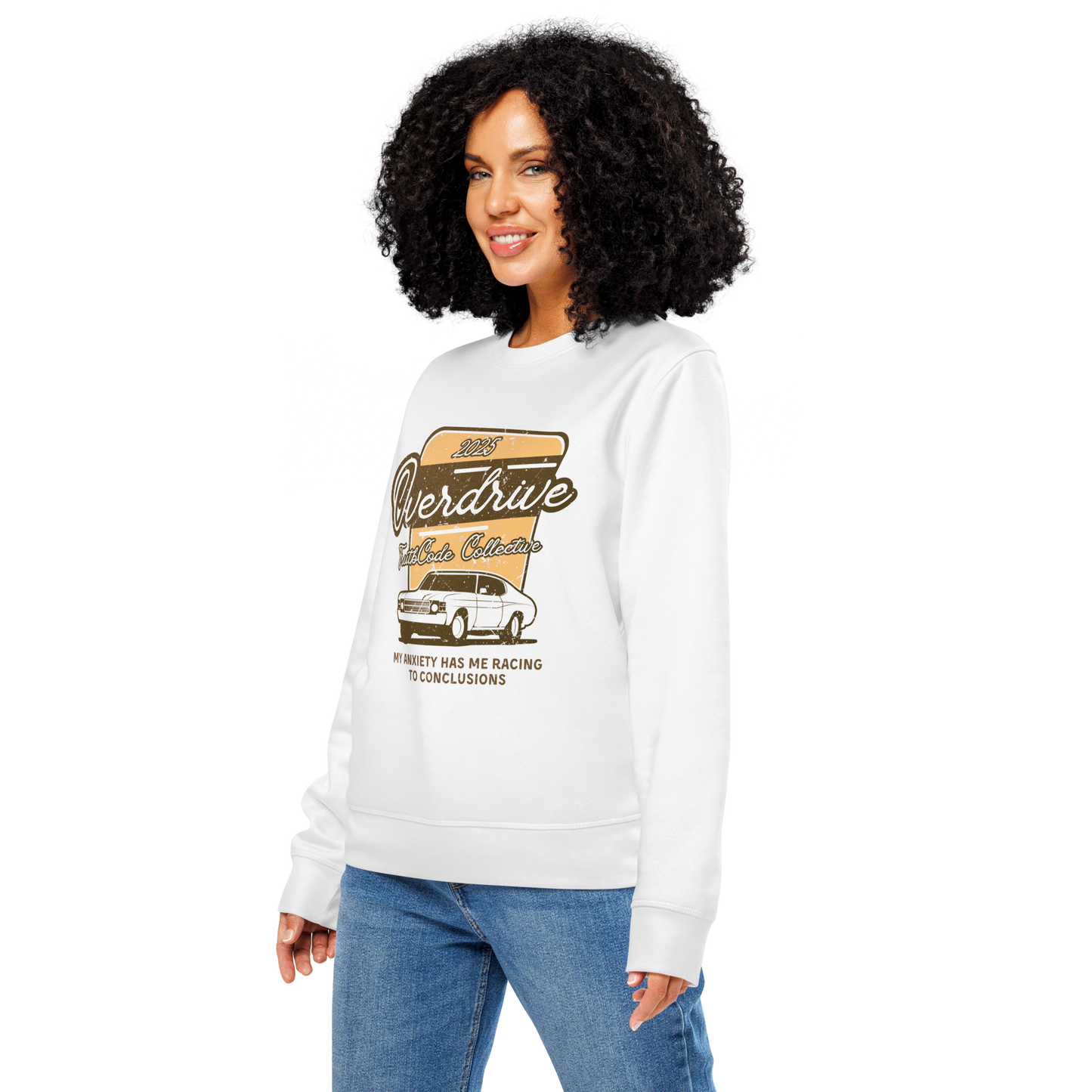 Woman wearing white organic sweatshirt with a vintage graphic design of a car and text 'Overdrive, my anxiety has me racing to conclusions' on a white background