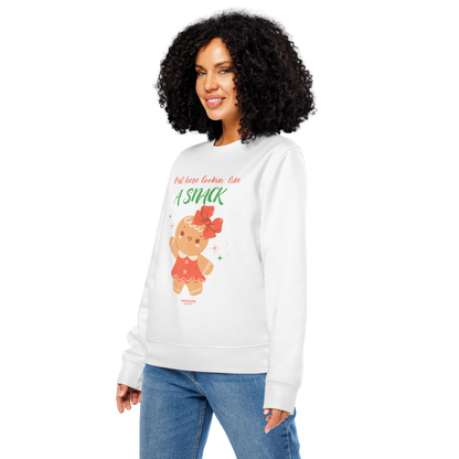 Woman wearing a white sweatshirt with a cartoon character and text on a white background