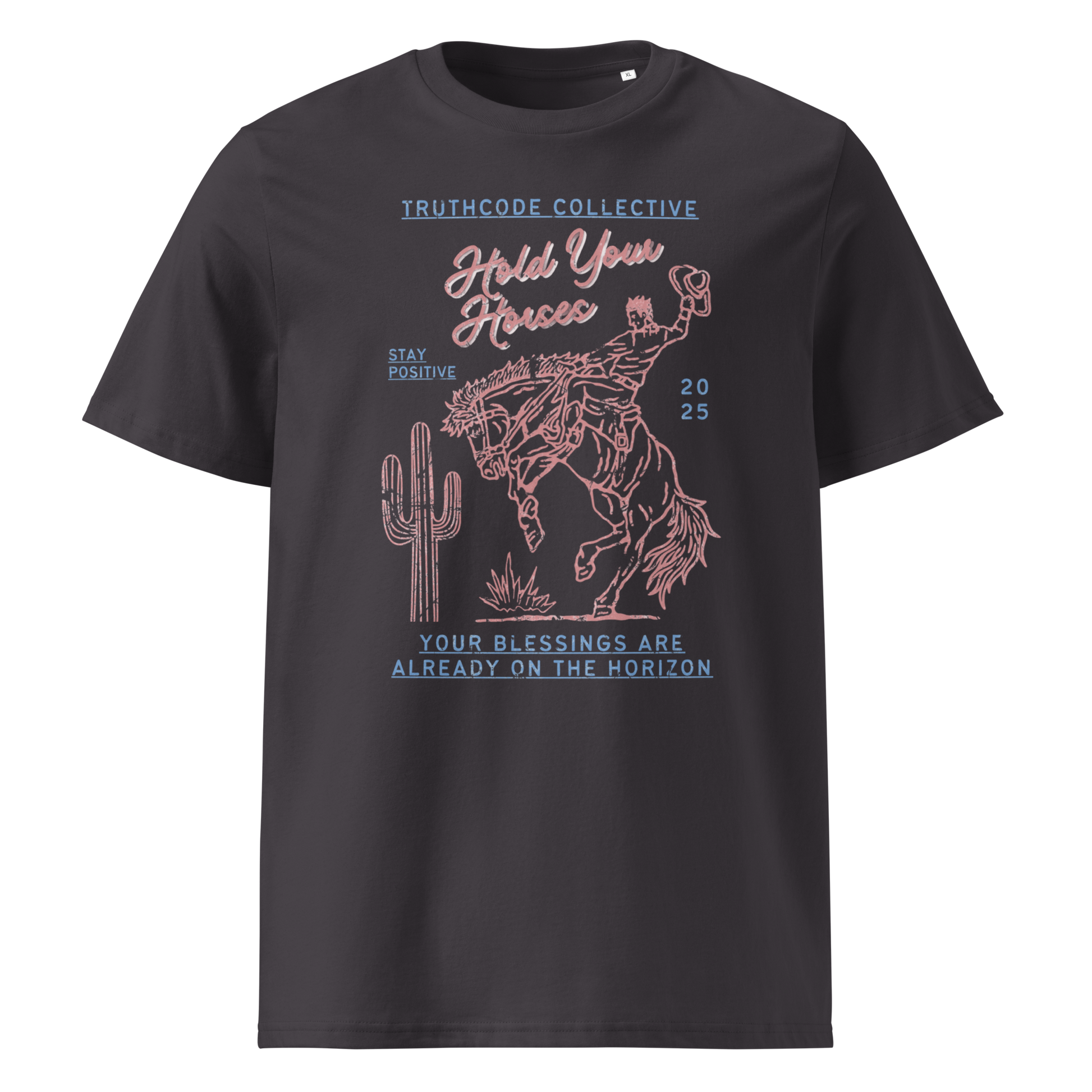 Black organic t- shirt with a western style graphic of a cowboy on a bucking bronco, with the text 'Hold your horses, your blessings are already on the horizon'