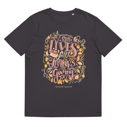 Dark gray organic t-shirt with colorful text design 'Let our lives be full of both thanks and giving' on a white background