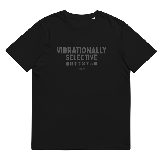Black organic t-shirt with text 'Vibrationally selective' on a white background