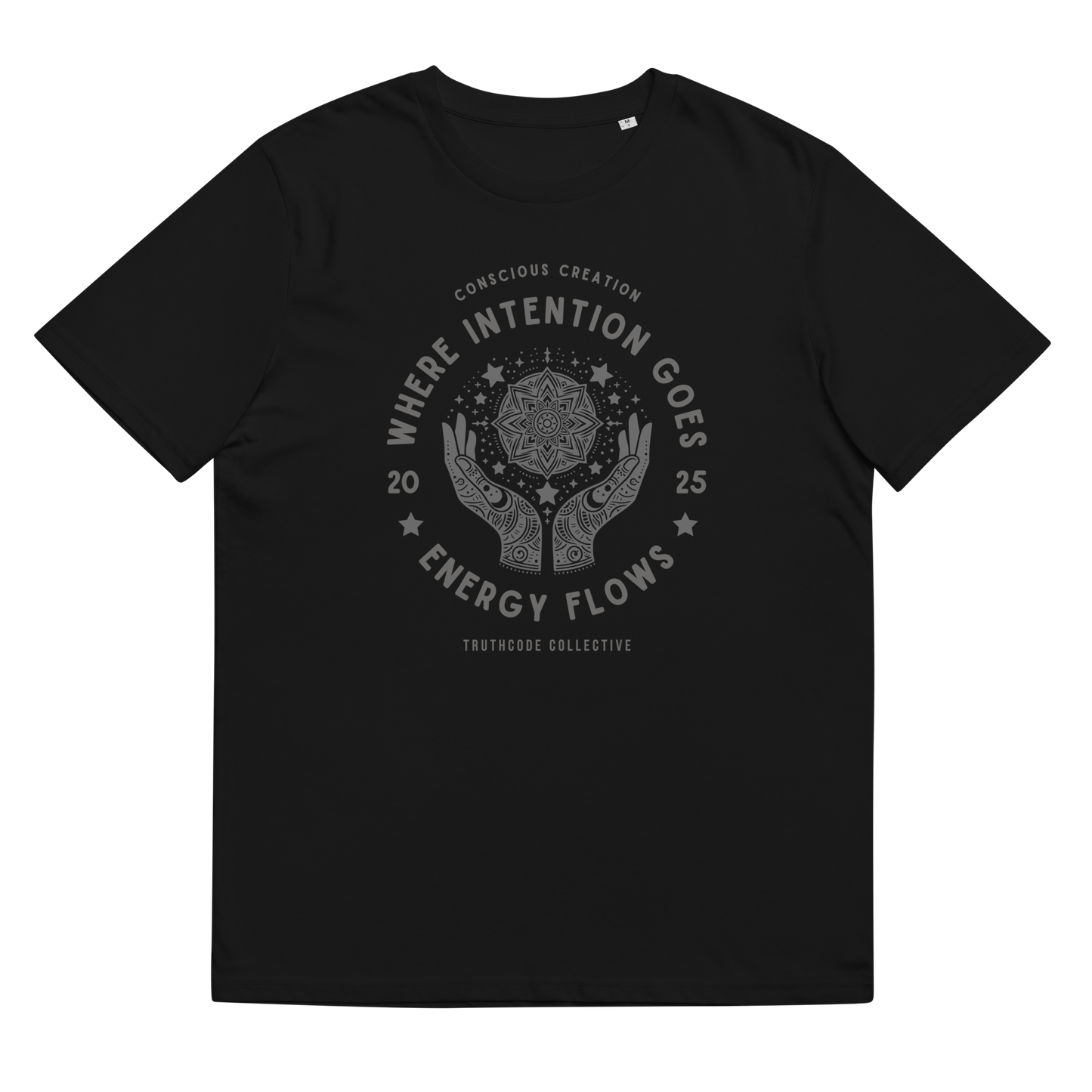 Black organic t-shirt with graphic design of hands around a mandala and text 'Where intention goes energy flows' on a white background