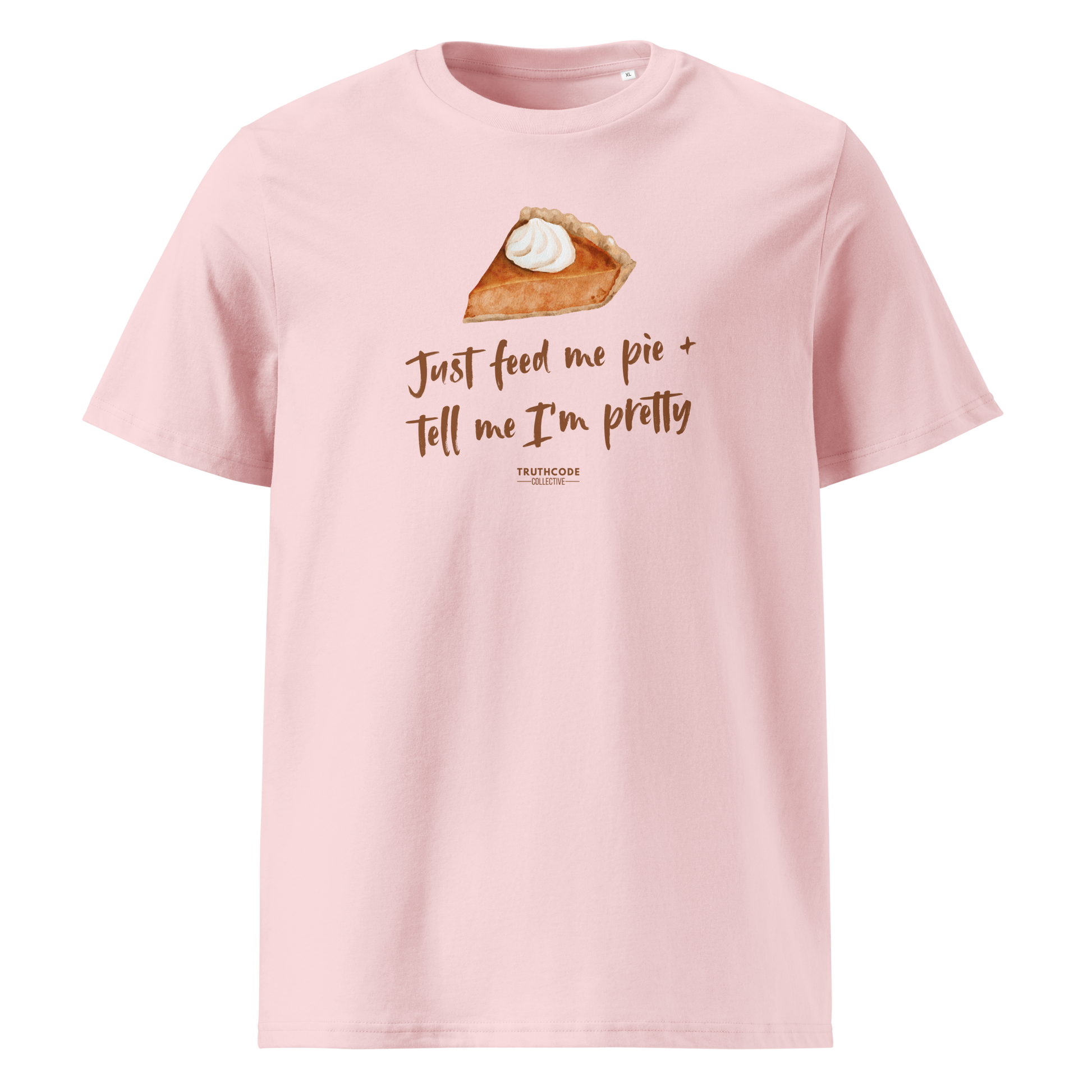 Pink organic t-shirt with a pie graphic and text 'Just feed me pie + tell me I'm pretty' on a white background
