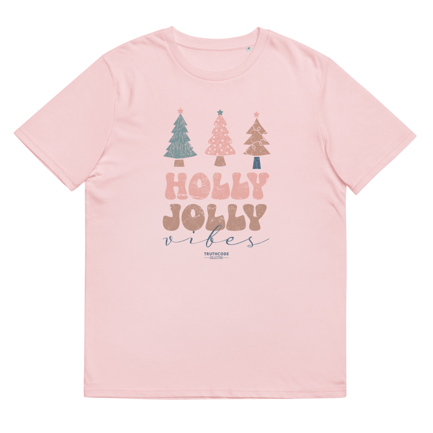 Pink t-shirt with Christmas tree design and 'Holly Jolly Vibes' text on a white background