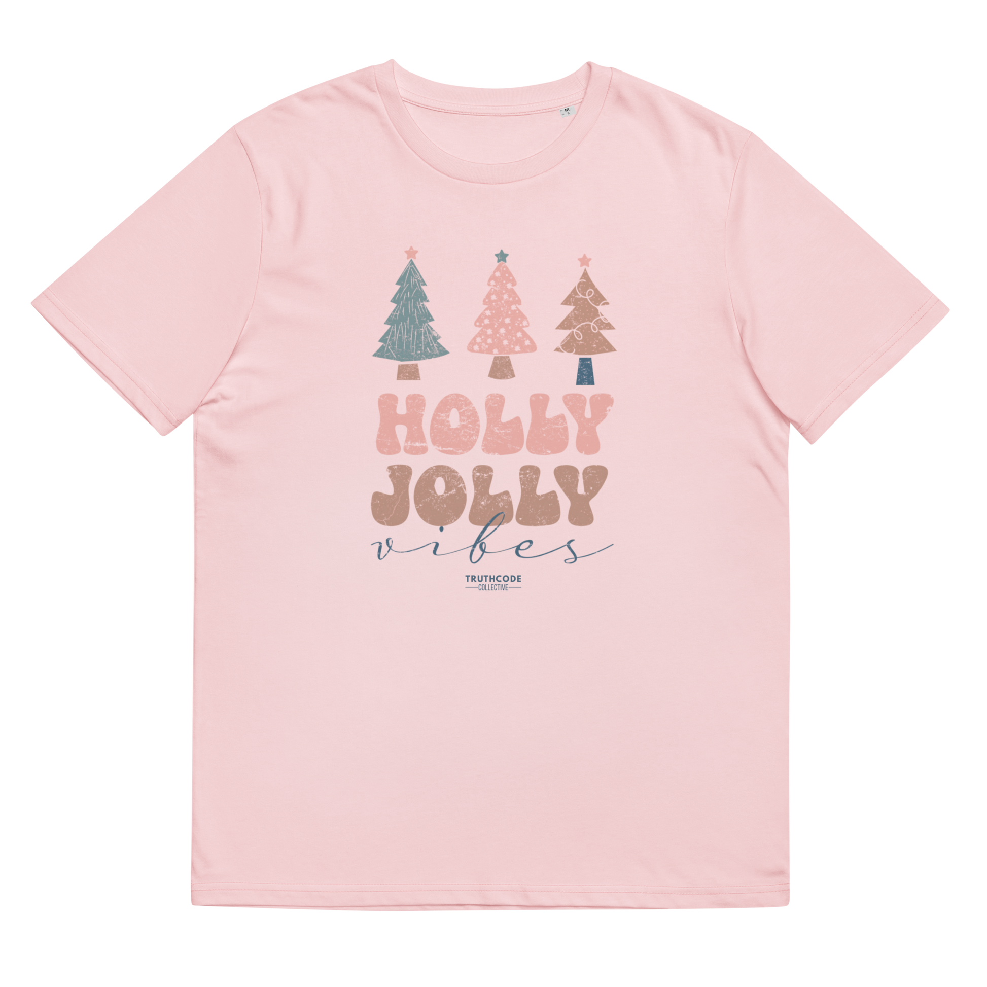 Pink t-shirt with Christmas tree design and 'Holly Jolly Vibes' text on a white background