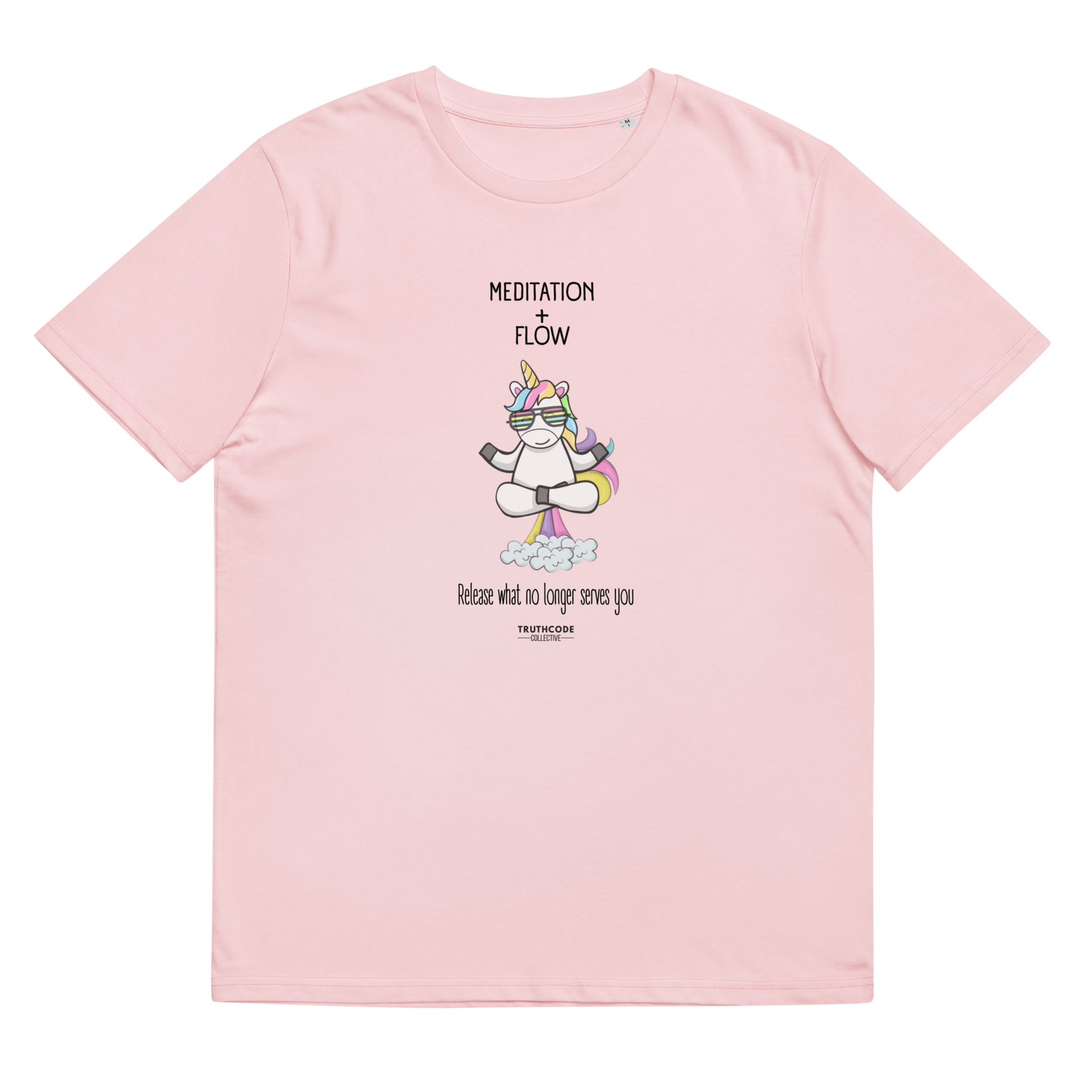 Pink organic t-shirt with a unicorn farting a rainbow graphic and text 'Meditation + Flow, release what no longer serves you' on a white background