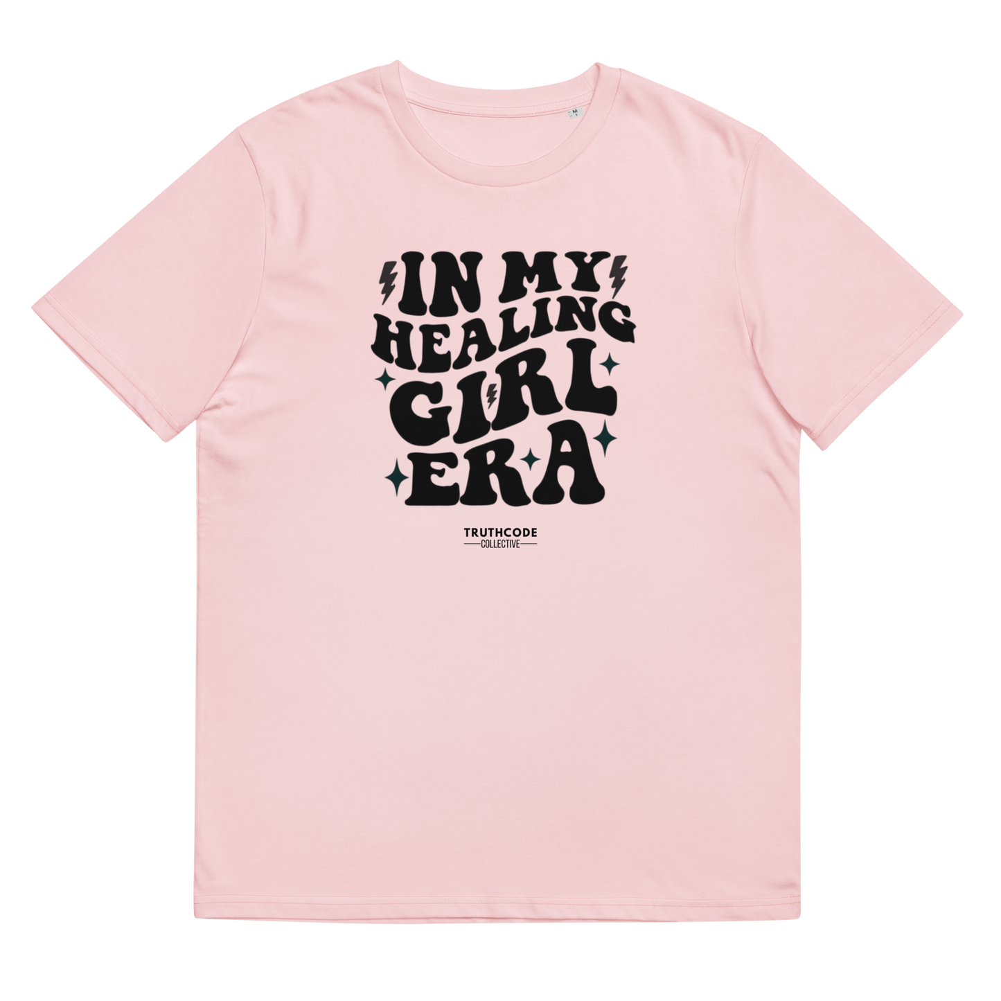 Pink organic t-shirt with black text 'IN MY HEALING GIRL ERA' on a white background