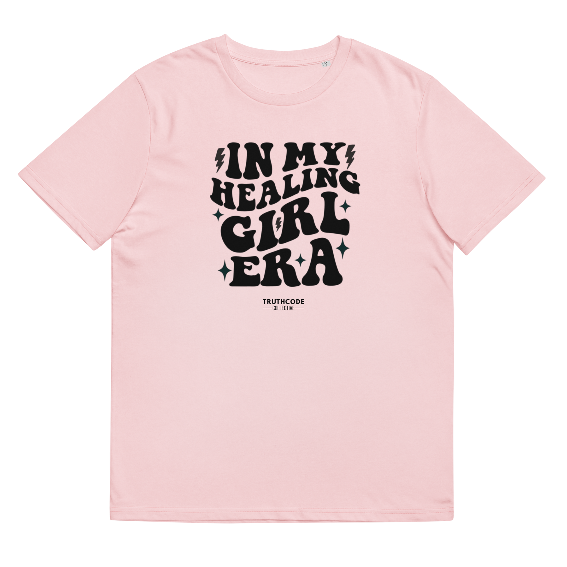 Pink organic t-shirt with black text 'IN MY HEALING GIRL ERA' on a white background