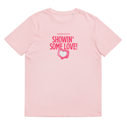 Pink organic t-shirt with pink text 'Showin' some love!' and heart graphic on a white background