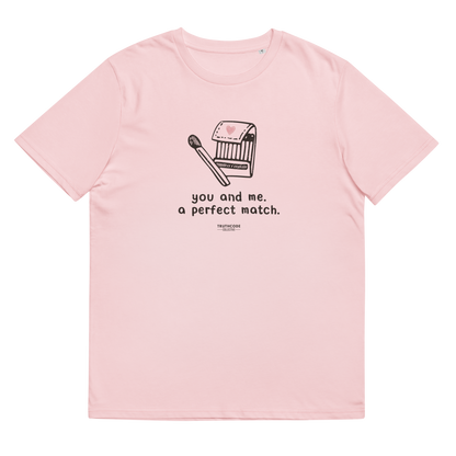 Pink organic t-shirt with match book graphic design and text 'You and me, a perfect match' on a white background