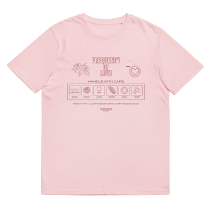 Pink organic t-shirt with text 'Frequency of love' and laundry tag style graphics with symbols relating to love, on a white background
