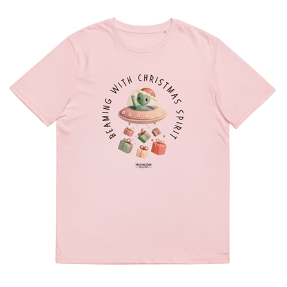 Pink organic t-shirt with cute alien in a spaceship Christmas-themed graphic and text 'Beaming with Christmas spirit'