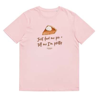 Pink organic t-shirt with a pie graphic and text 'Just feed me pie + tell me I'm pretty'