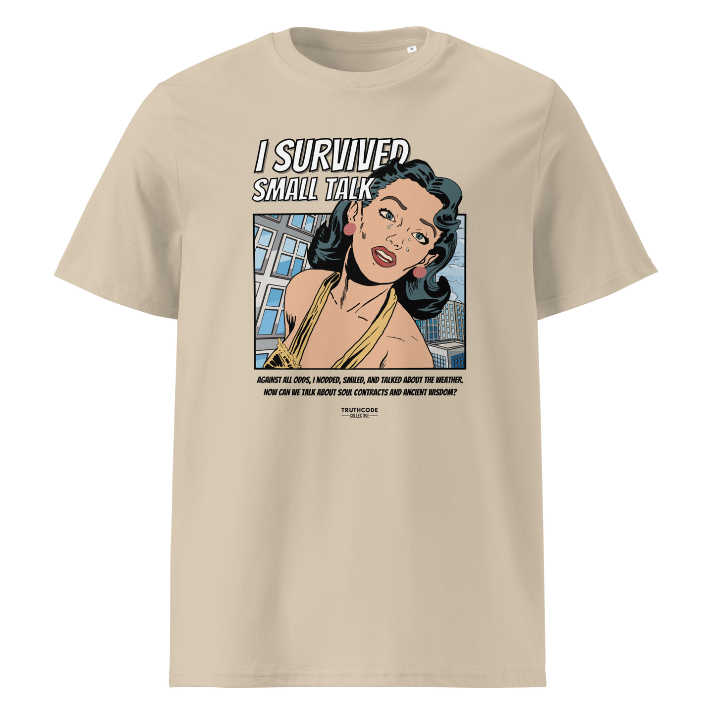 Beige organic t-shirt with a graphic design featuring a comic cartoon woman and text with lighthearted saying 'I SURVIVED SMALL TALK' on a white background