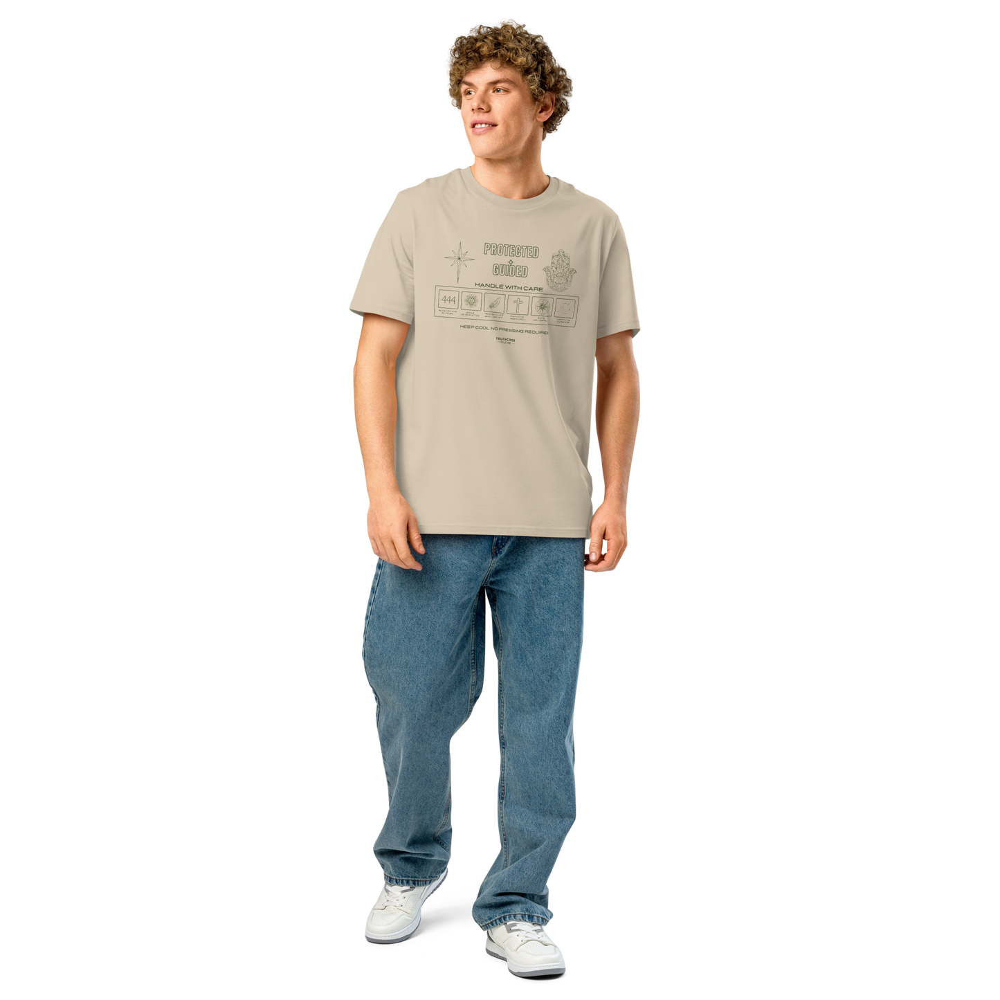 Guy wearing beige organic t-shirt with text 'Protected + guided' with symbols and graphics relating to it on a white background